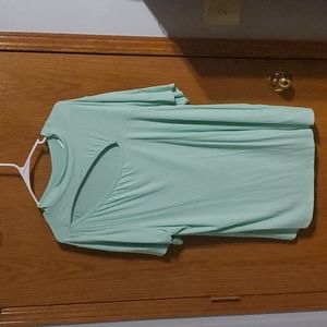 Mint green blouse with cutout detail